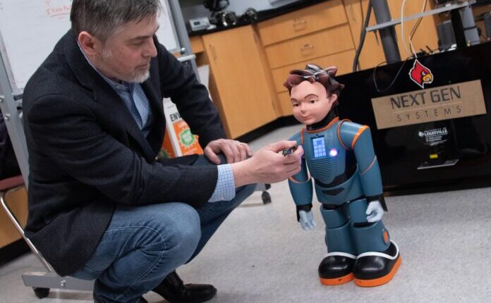 Dan Popa and other researchers at the Louisville Automation and Robotics Research Institute at the University of Louisville (LARRI) use social robots to focus on treating cognitive impairments in children on the autism spectrum. University of Louisville photo.