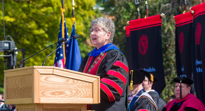 UofL’s 19th president, Dr. Kim Schatzel, at the podium during her inauguration ceremony Sept. 29.