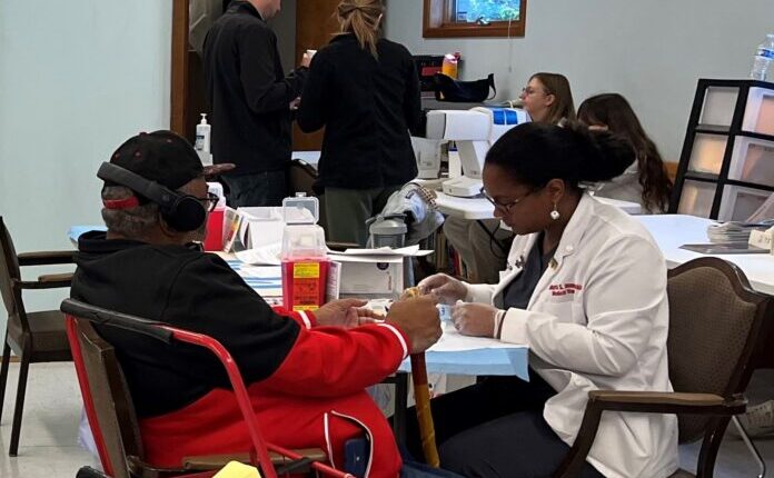 UofL medical students participate in a Compassion Clinic at Redeemer Lutheran Church in West Louisville.