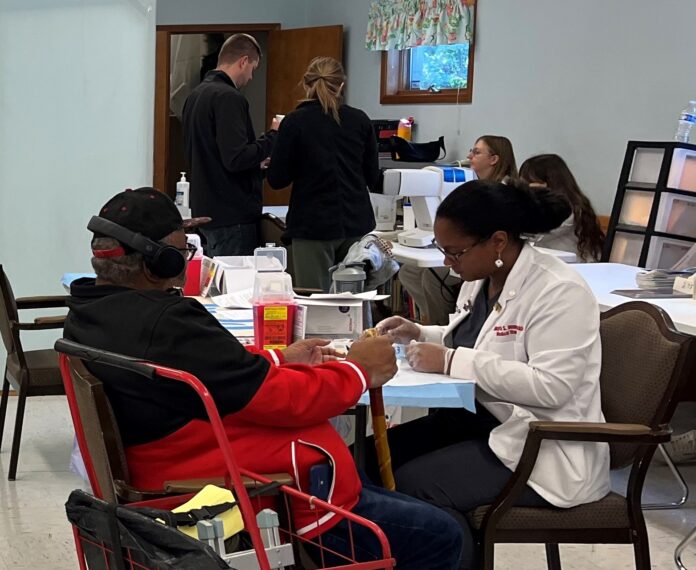 UofL medical students participate in a Compassion Clinic at Redeemer Lutheran Church in West Louisville.