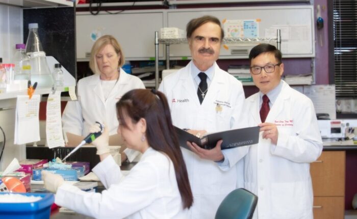 UofL cardiologist Roberto Bolli, center, leads a new, multicenter clinical trial of an IV-delivered stem cell therapy for heart failure at the University of Louisville and UofL Health. UofL photo.