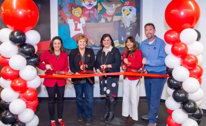 UofL leaders joined representatives from Texas Roadhouse and Buffalo Construction to open the newly renovated Texas Roadhouse Student Center in the College of Business