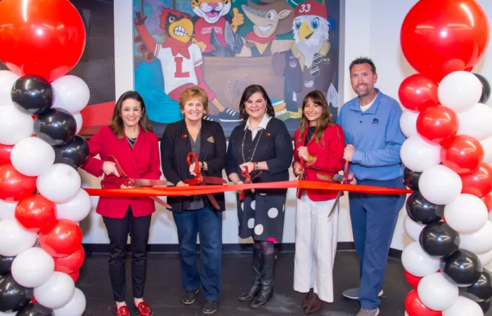 UofL leaders joined representatives from Texas Roadhouse and Buffalo Construction to open the newly renovated Texas Roadhouse Student Center in the College of Business